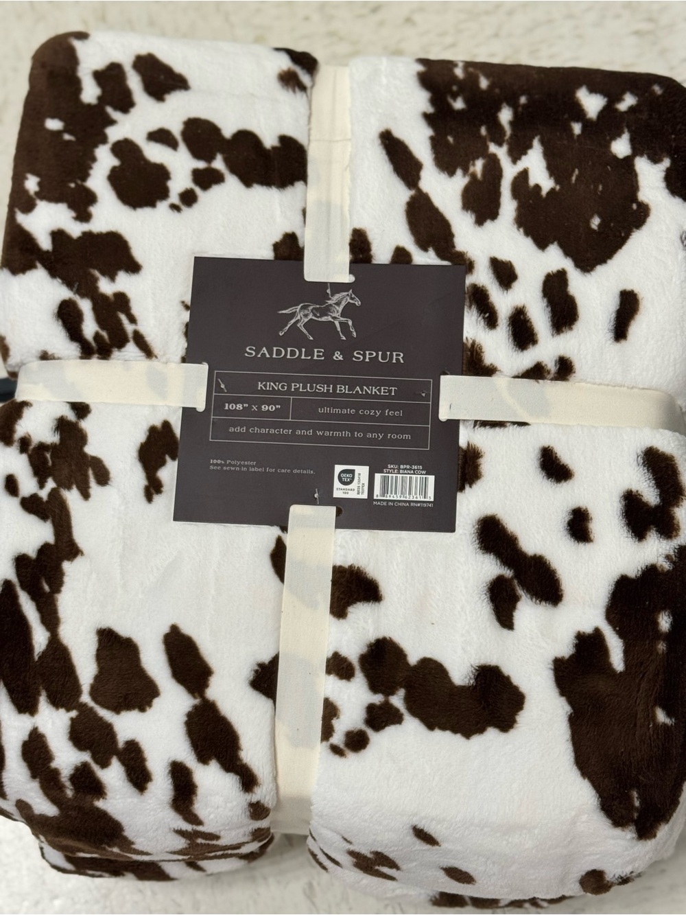 Saddle & Spur Cow Print Plush Blanket - Brown & White